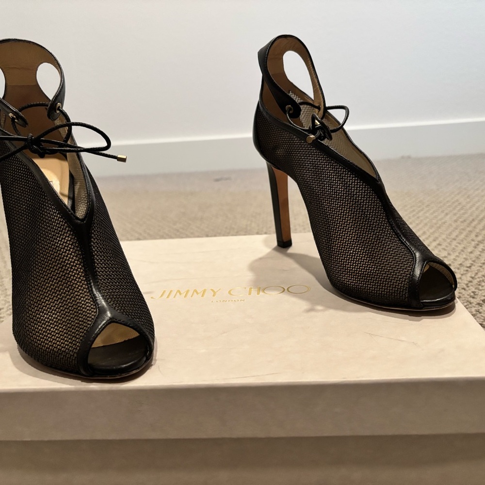 Jimmy Choo Black Heels with Peep-Toe Design and High Slender Heel